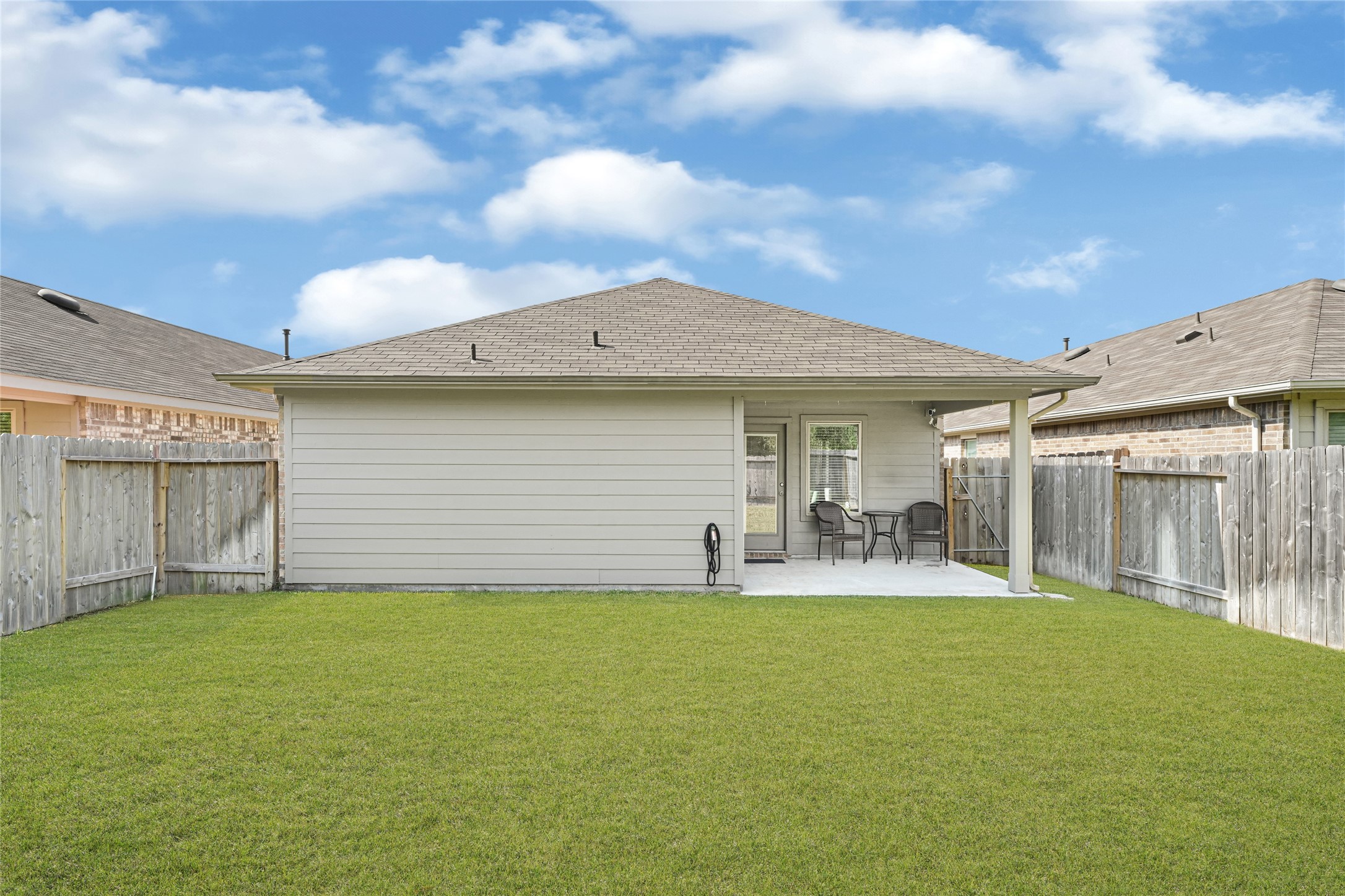 22438 Forest Gorge Lane Spring, TX 77373 - Photo 19 of 20 a front view of house with yard and seating area