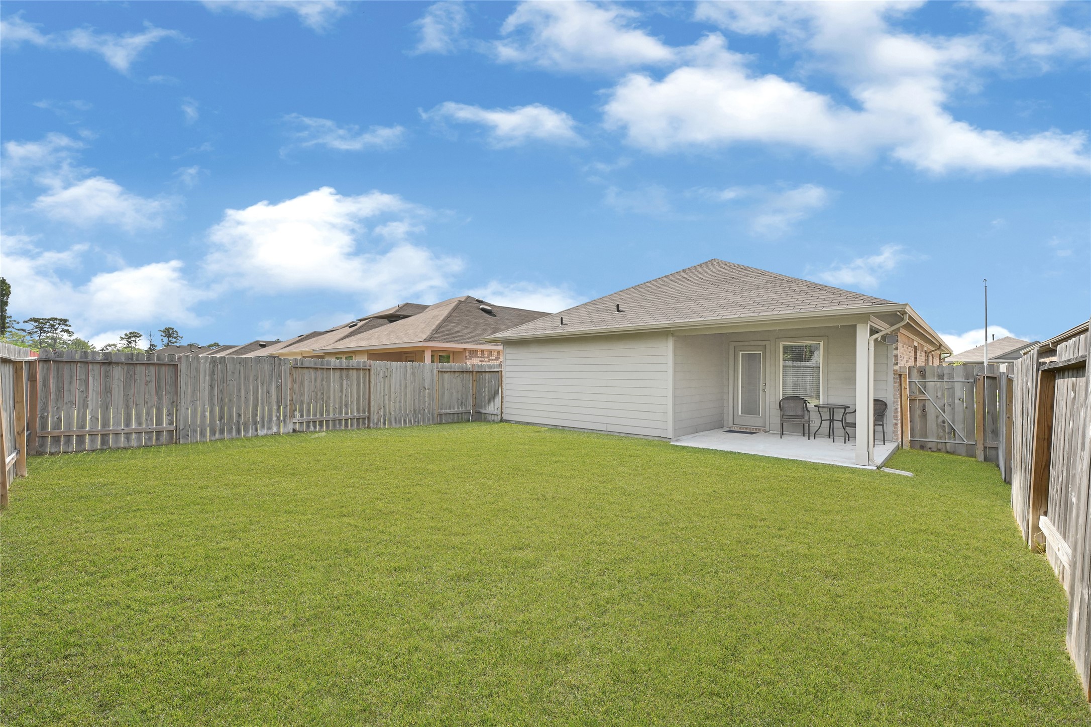 22438 Forest Gorge Lane Spring, TX 77373 - Photo 20 of 20 a view of a house with a yard and a large tree