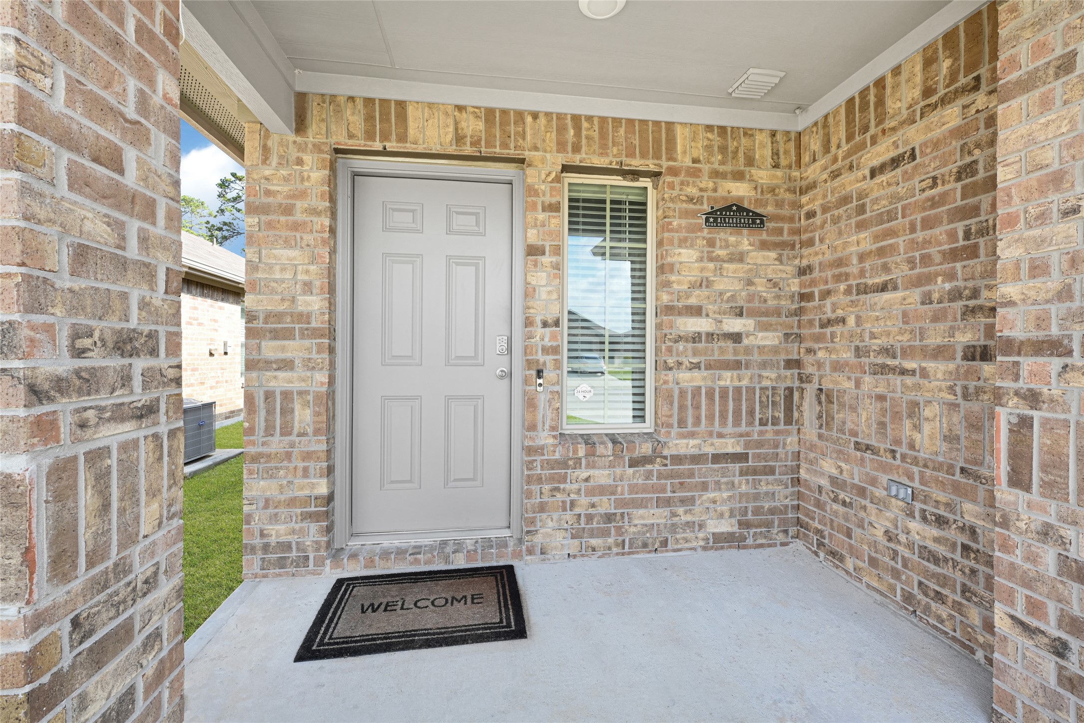 22438 Forest Gorge Lane Spring, TX 77373 - Photo 3 of 20 a view of a door with wooden floor and a window