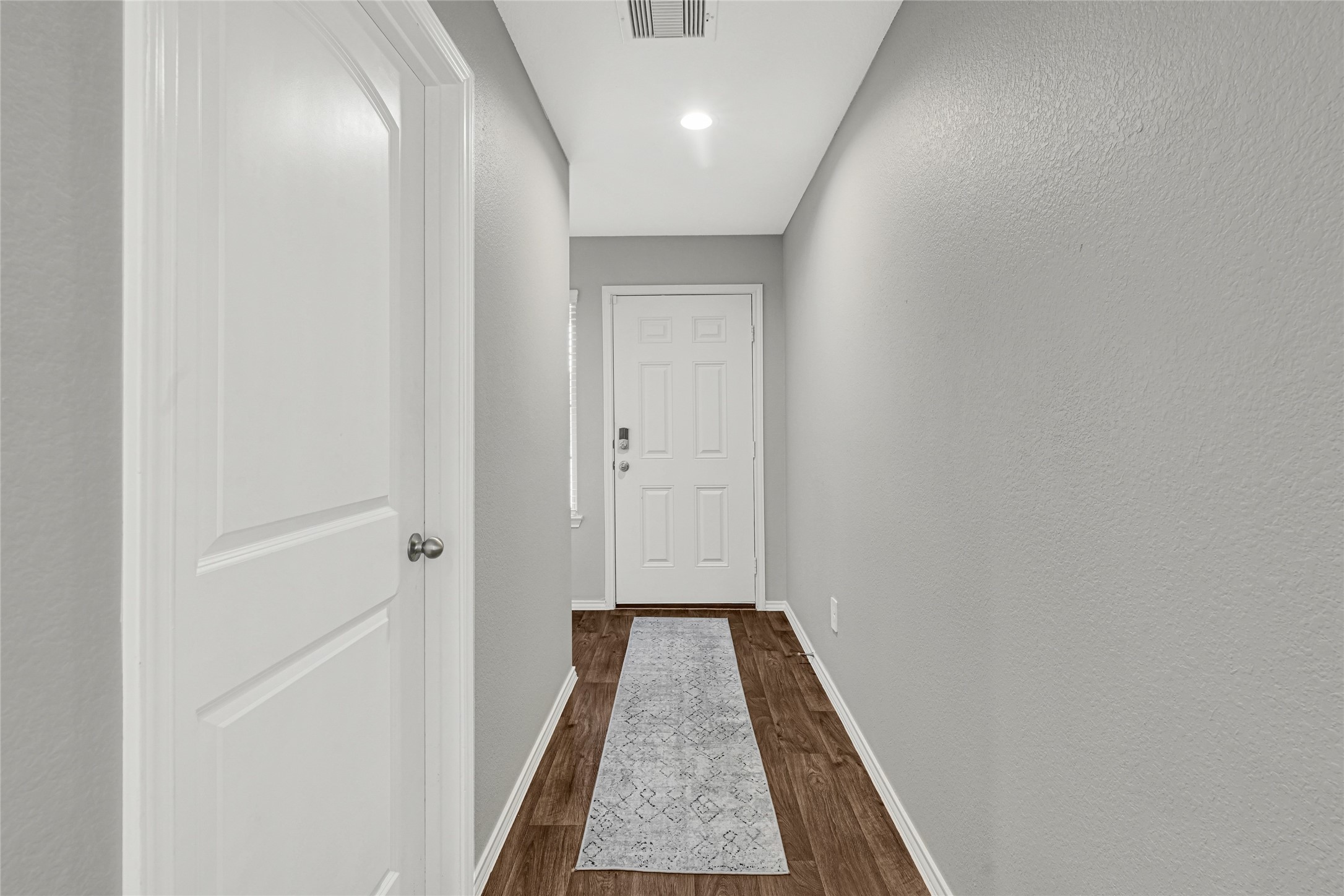 22438 Forest Gorge Lane Spring, TX 77373 - Photo 5 of 20 a view of hallway with wooden floor