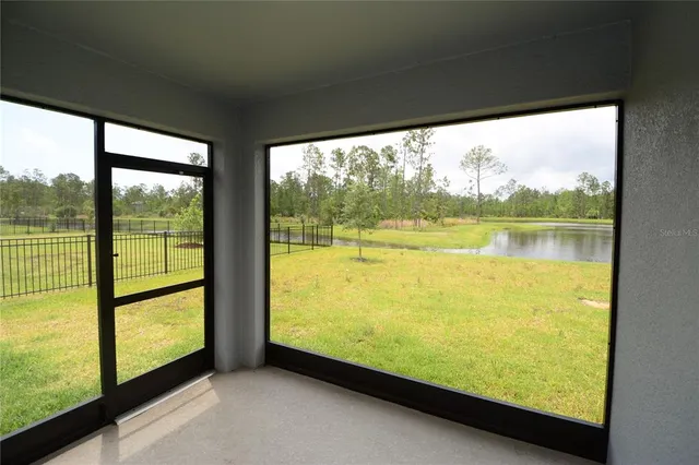 a view of a lake from a window