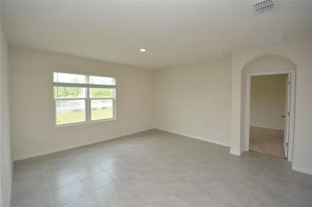 an empty room with windows