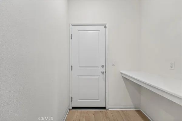 a view of an empty walk in closet