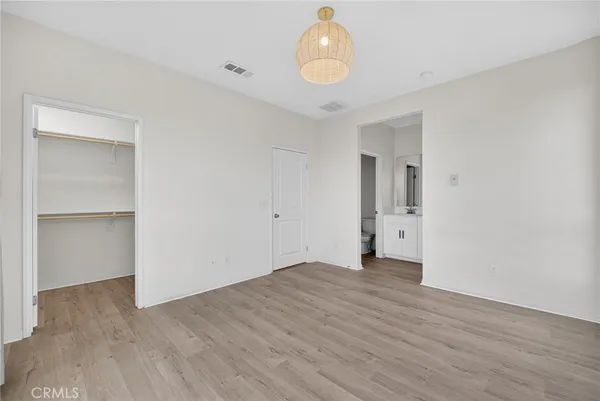 a view of an empty walk in closet