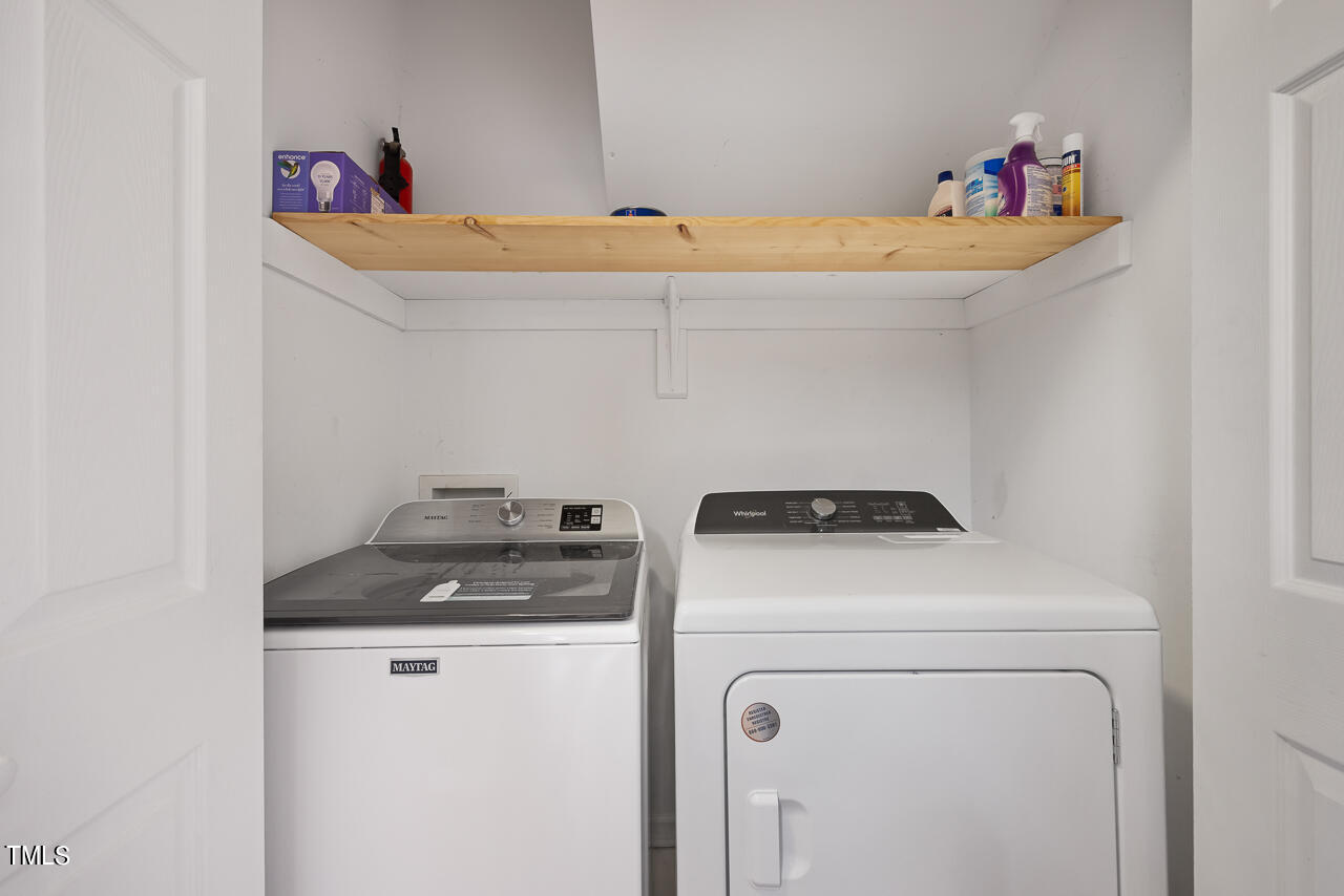 6921 Lamarsh Court Raleigh, NC 27617 - Photo 15 of 37 a utility room with dryer and washer