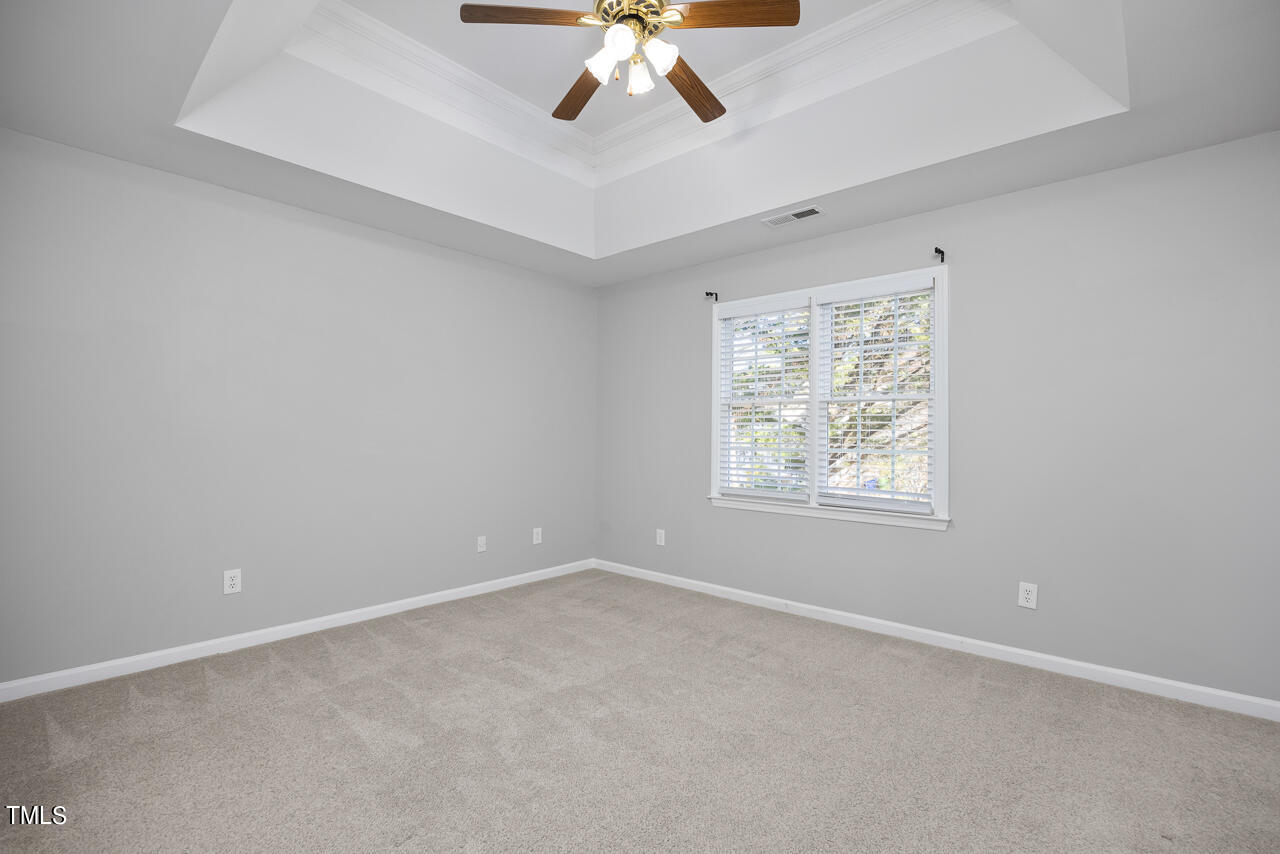6921 Lamarsh Court Raleigh, NC 27617 - Photo 16 of 37 an empty room with a window