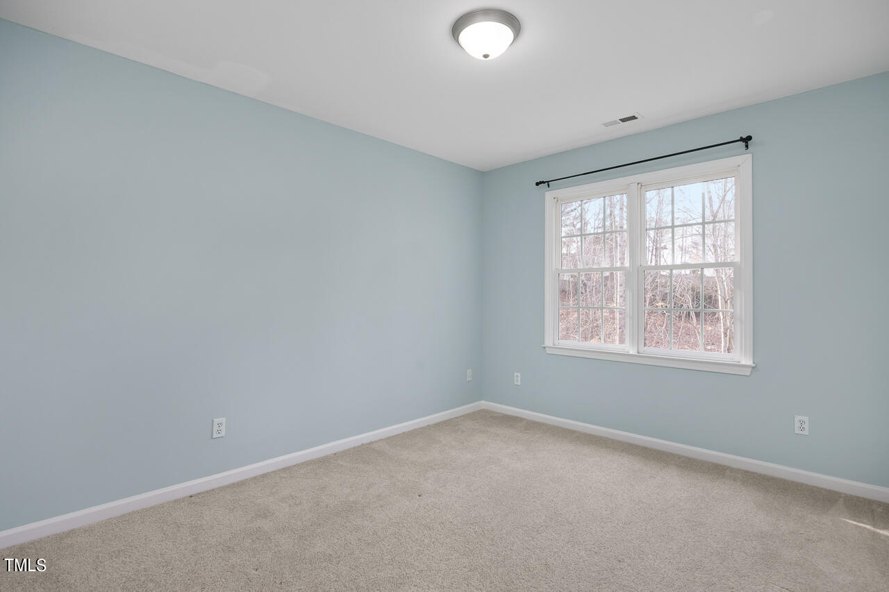 6921 Lamarsh Court Raleigh, NC 27617 - Photo 23 of 37 an empty room with a window