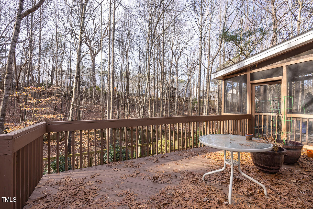 6921 Lamarsh Court Raleigh, NC 27617 - Photo 28 of 37 a view of a chairs and table in the patio