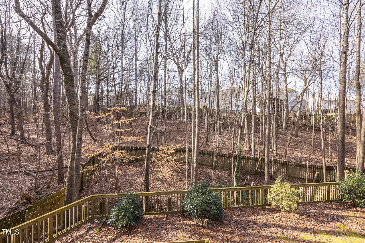 6921 Lamarsh Court Raleigh, NC 27617 - Photo 29 of 37 a view of a building with a yard