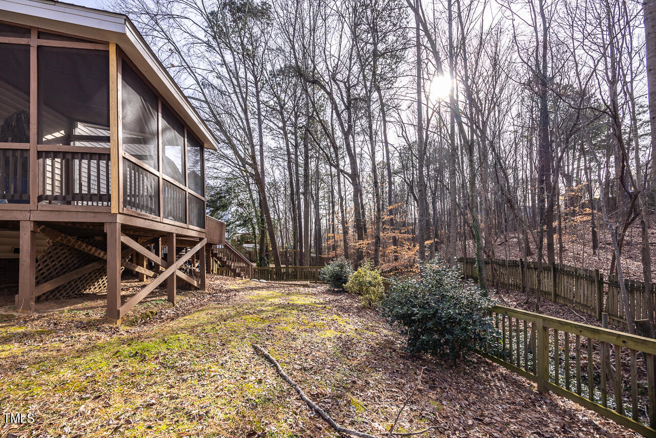 6921 Lamarsh Court Raleigh, NC 27617 - Photo 31 of 37 a view of house with backyard and slide