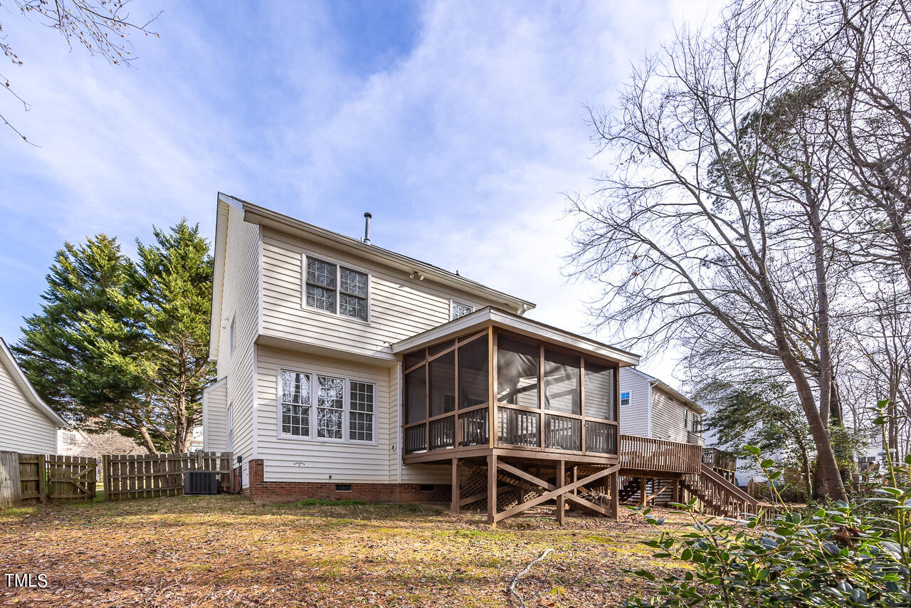6921 Lamarsh Court Raleigh, NC 27617 - Photo 33 of 37 a view of a house with a yard