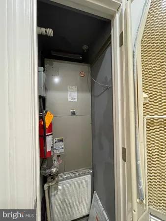 a view of a patio with a table and chairs