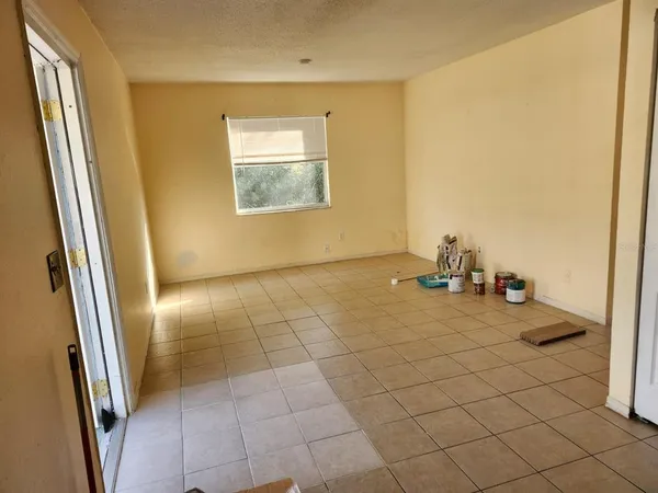 a view of a livingroom with wooden floor