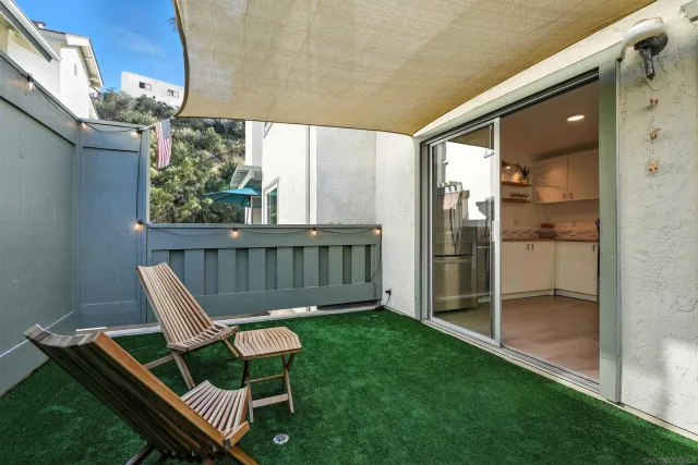 a view of backyard with a table and chair