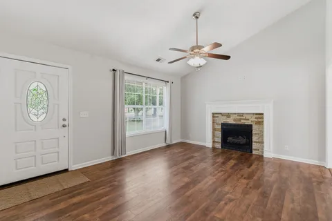 a kitchen with stainless steel appliances granite countertop a refrigerator sink and cabinets