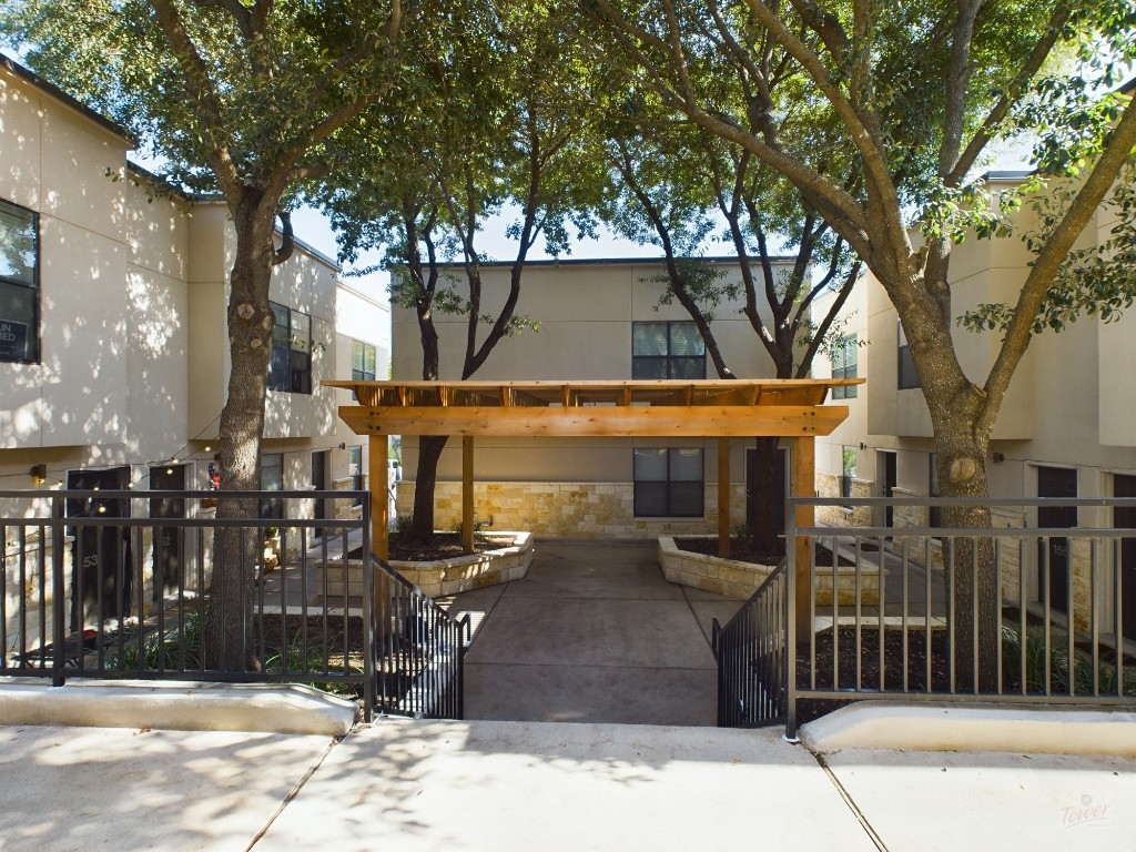 a front view of a building with street view