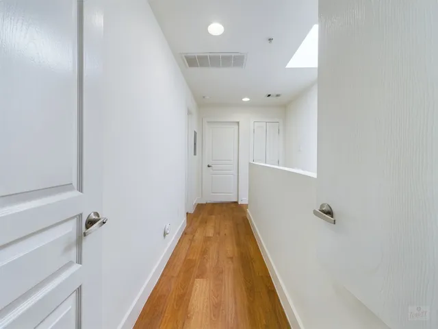 a black and white photo of a bench