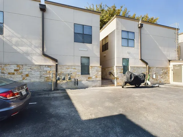 a view of a street with cars