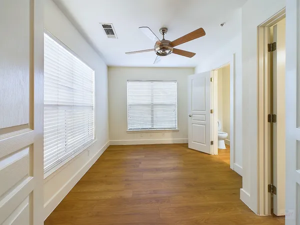 a view of an empty room and window