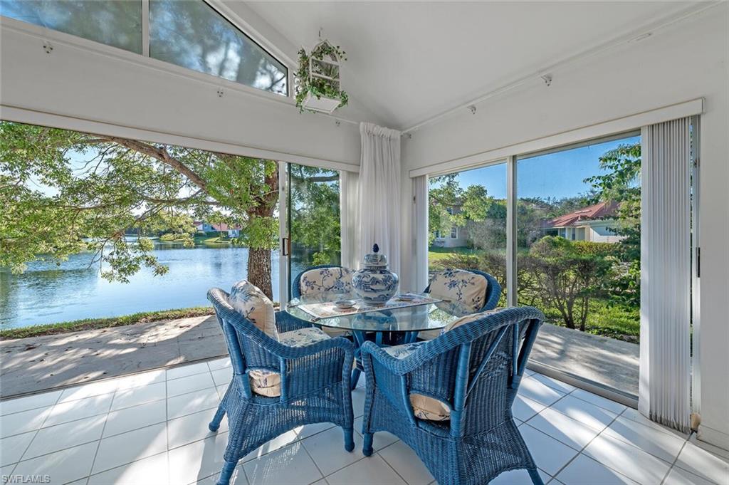 3574 Midas Place Naples, FL 34105 - Photo 26 of 29 a dining room with furniture and window