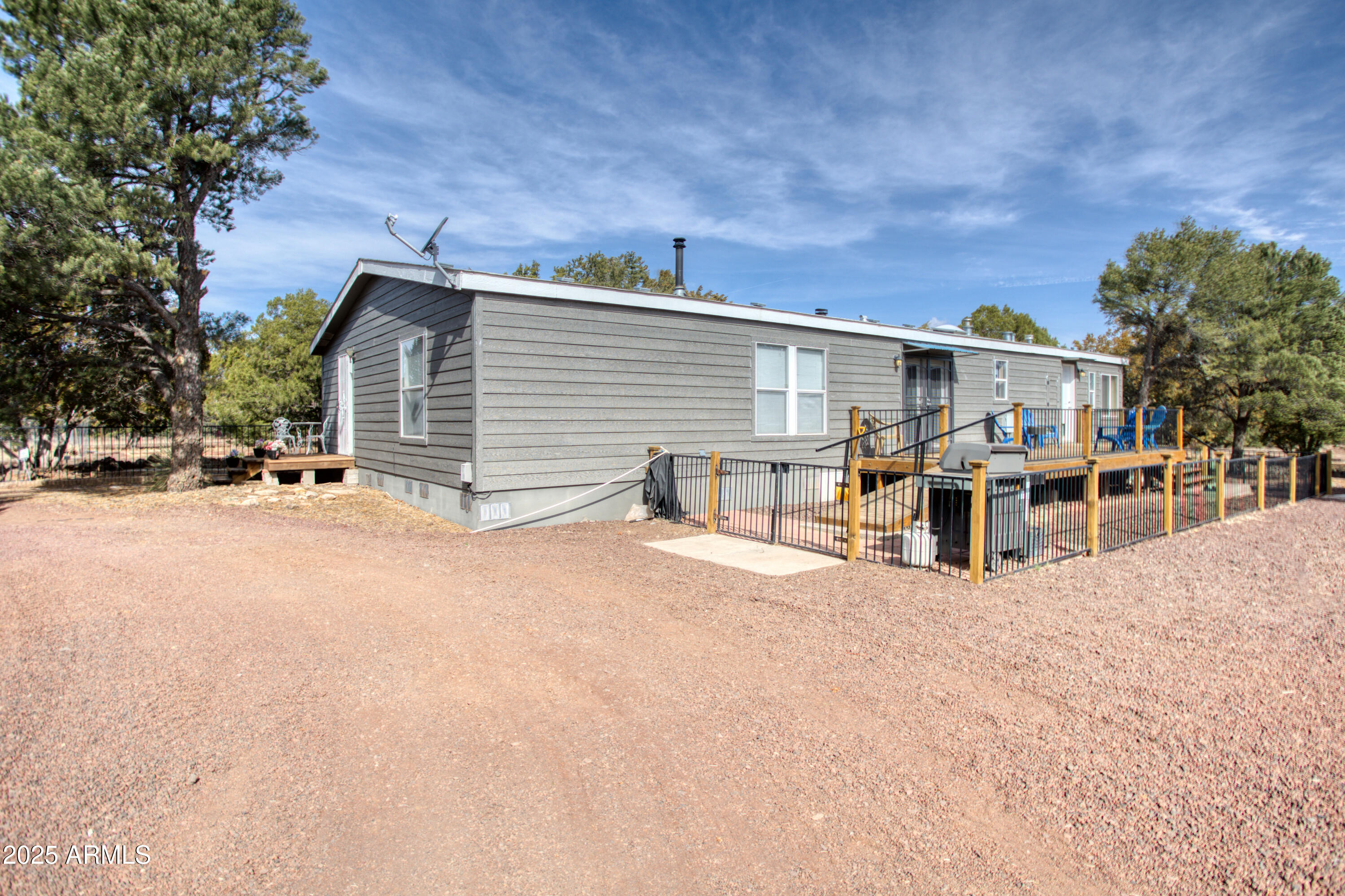 125 County Rd N3077 Show Low, AZ 85901 - Photo 28 of 71 a view of a house with a snow in the yard