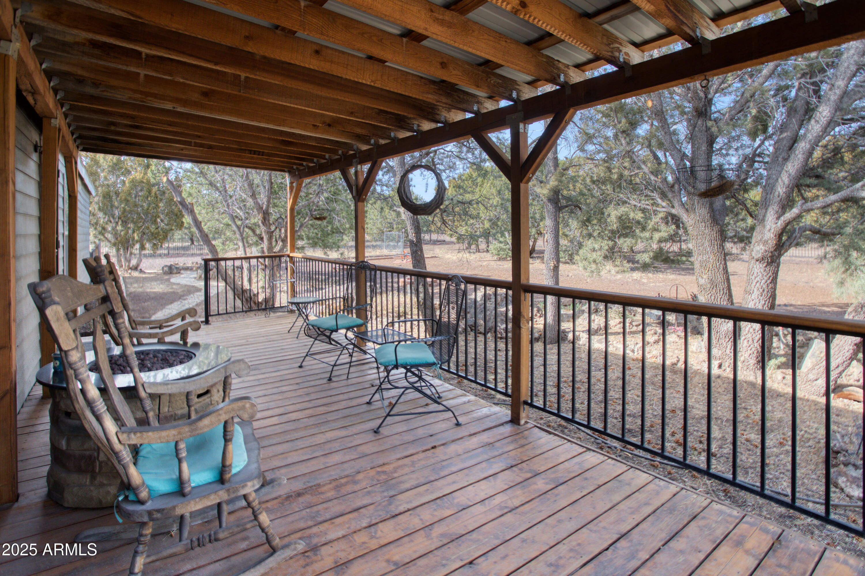125 County Rd N3077 Show Low, AZ 85901 - Photo 29 of 71 a view of chairs with wooden floor