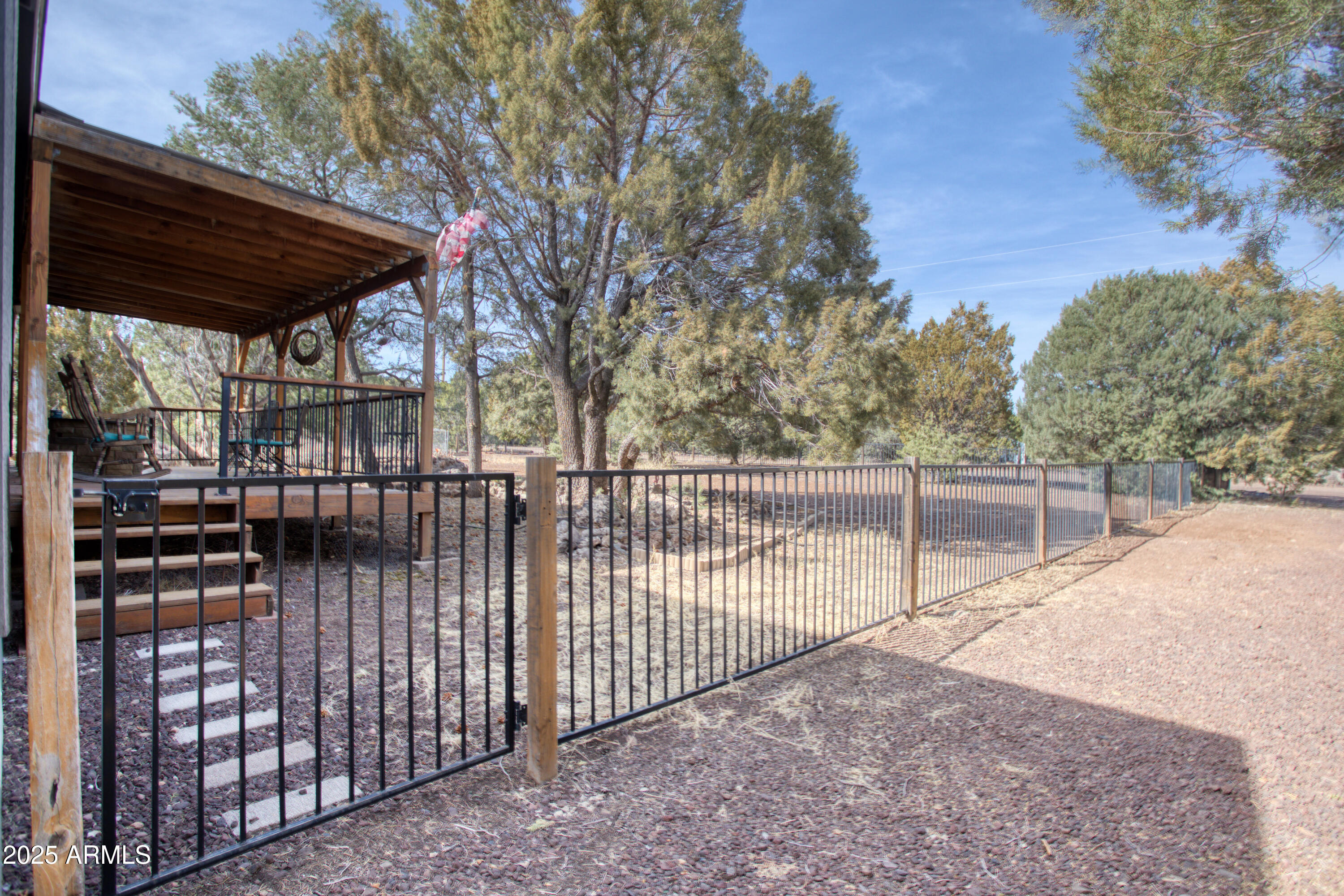 125 County Rd N3077 Show Low, AZ 85901 - Photo 30 of 71 a view of a wrought iron fences in front of house