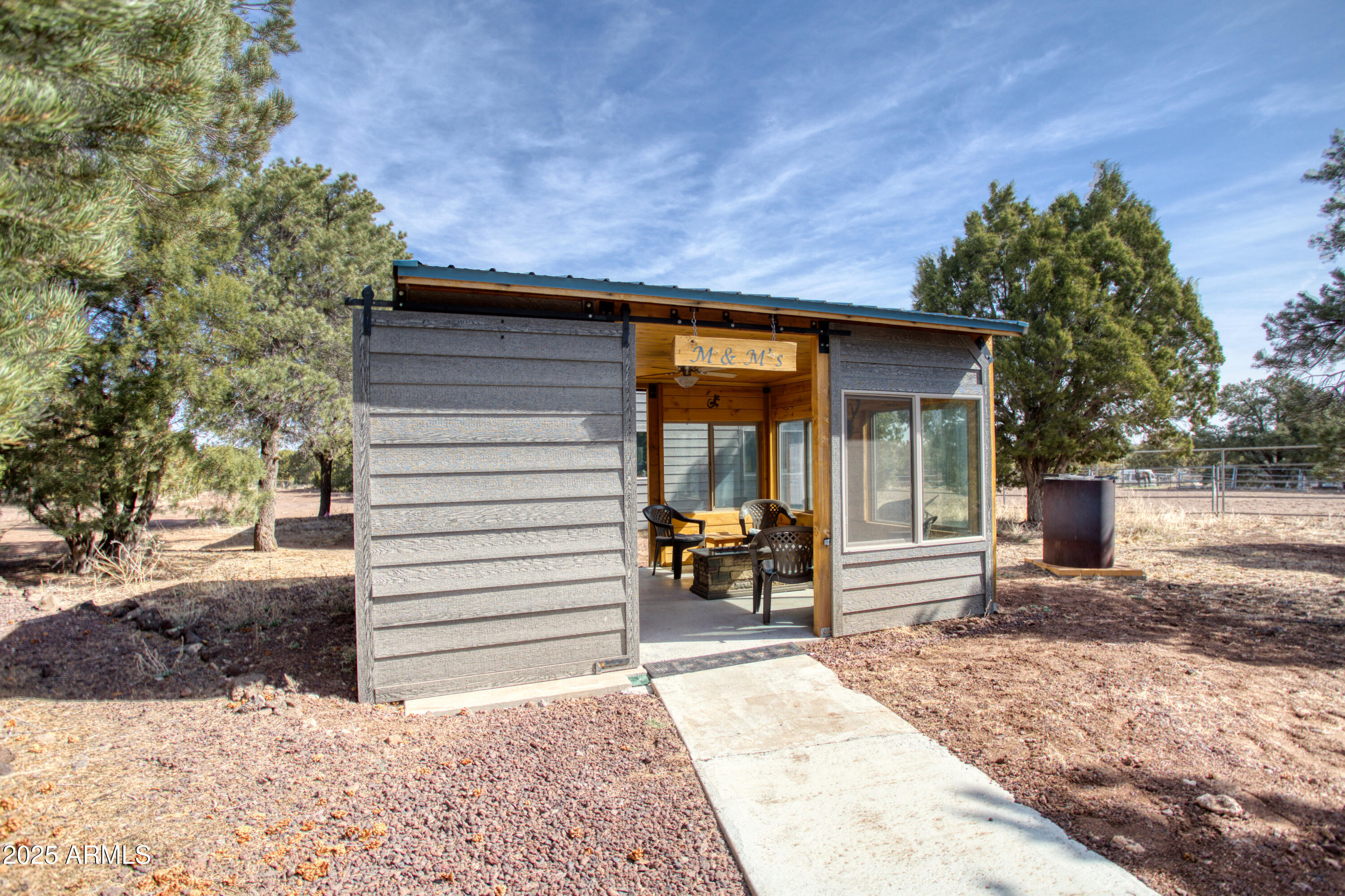 125 County Rd N3077 Show Low, AZ 85901 - Photo 34 of 71 a view of a house with a patio