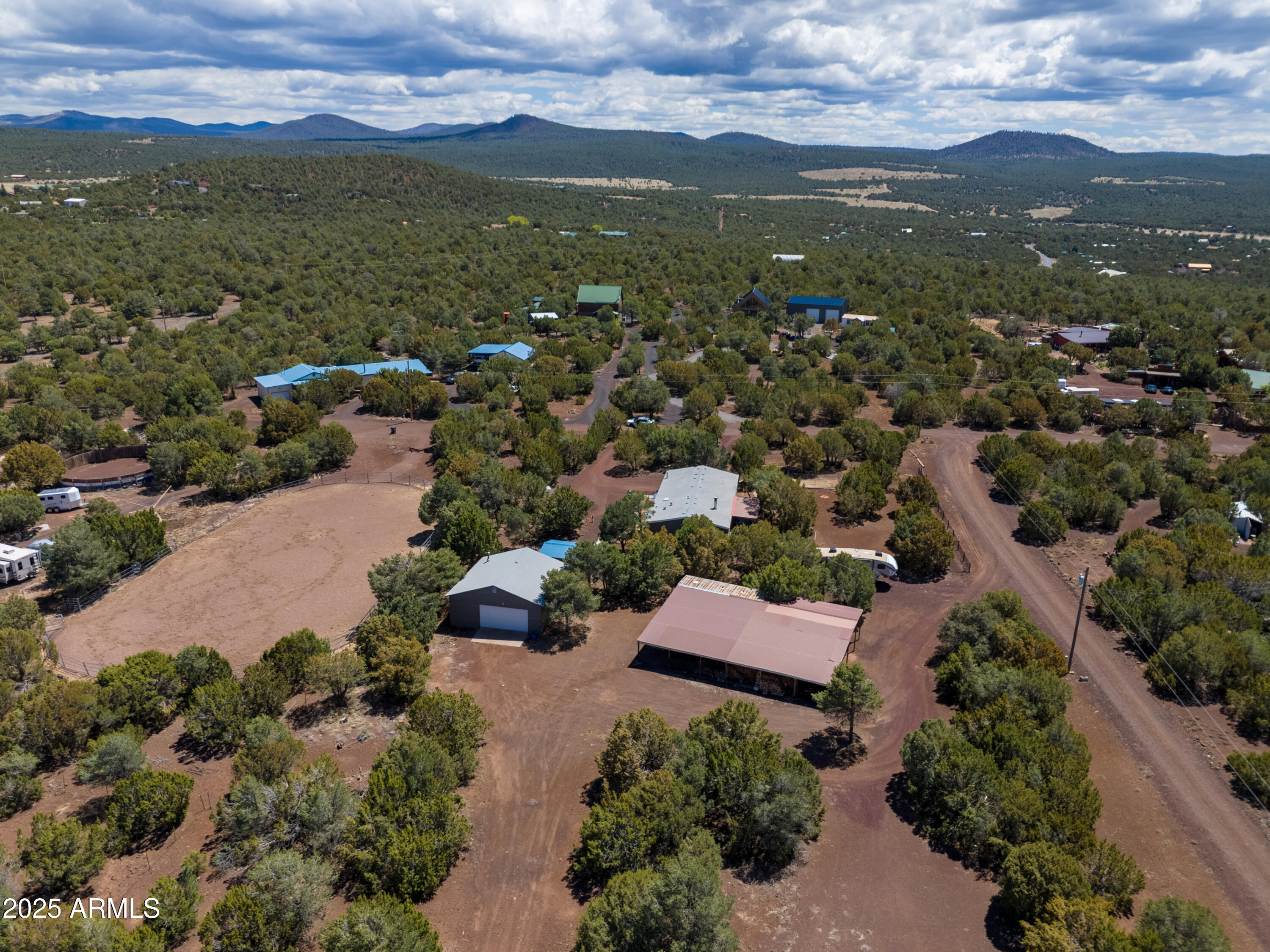 125 County Rd N3077 Show Low, AZ 85901 - Photo 56 of 71 an aerial view of residential houses with outdoor space