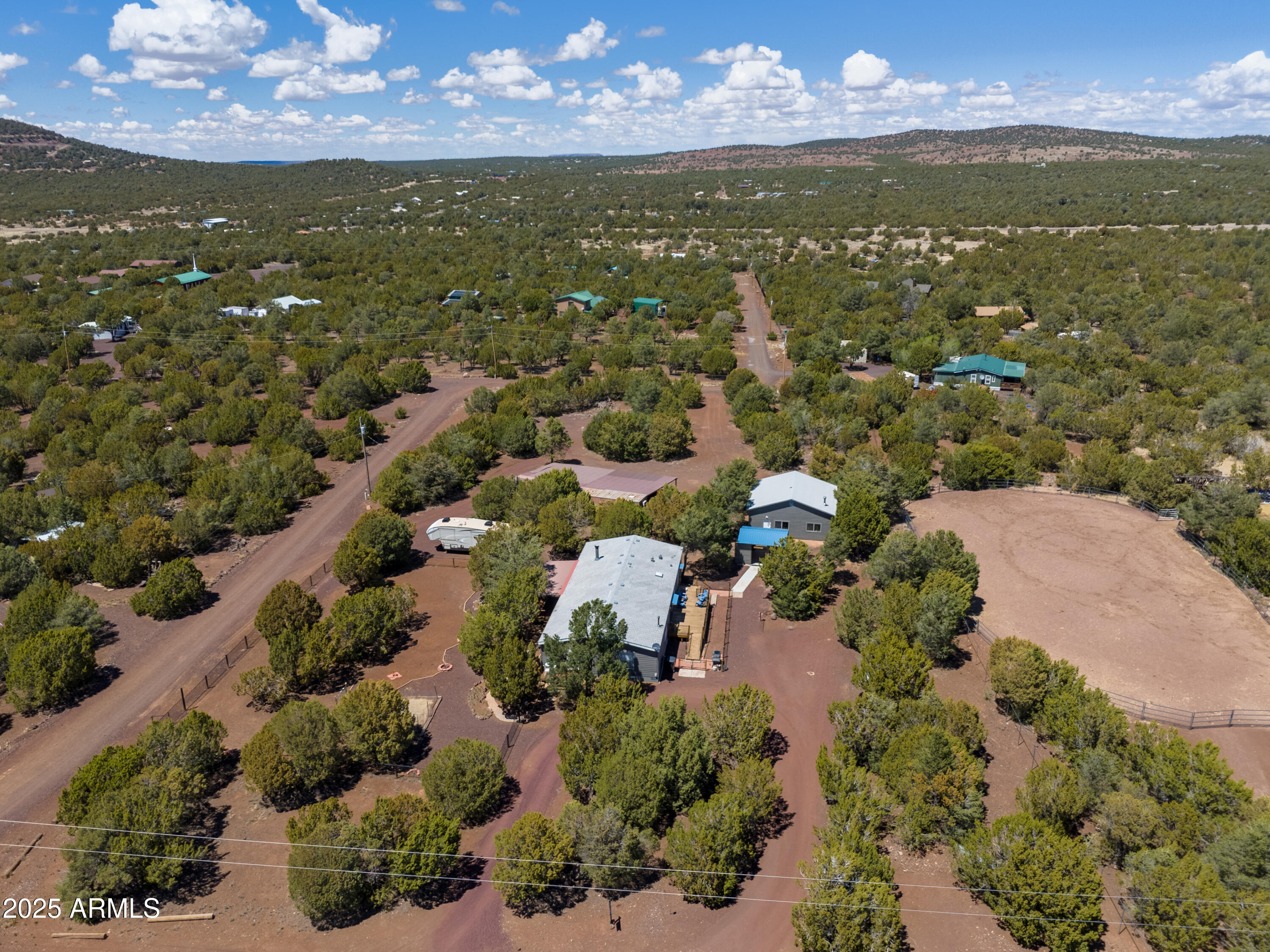 125 County Rd N3077 Show Low, AZ 85901 - Photo 58 of 71 an aerial view of residential houses with outdoor space