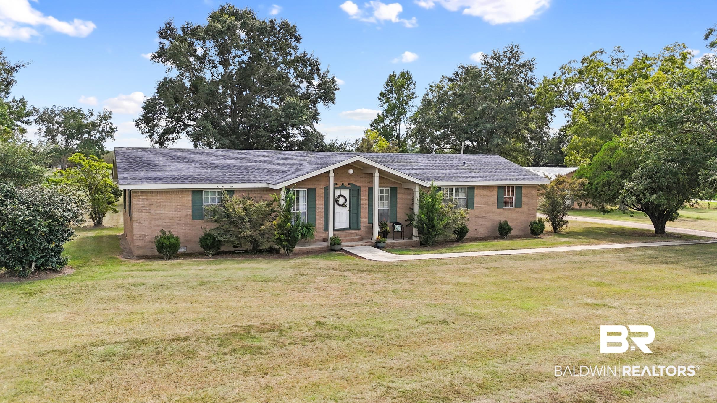 15600 Fackler Road Loxley, AL 36551 - Photo 49 of 51 Ranch-style house with a front lawn