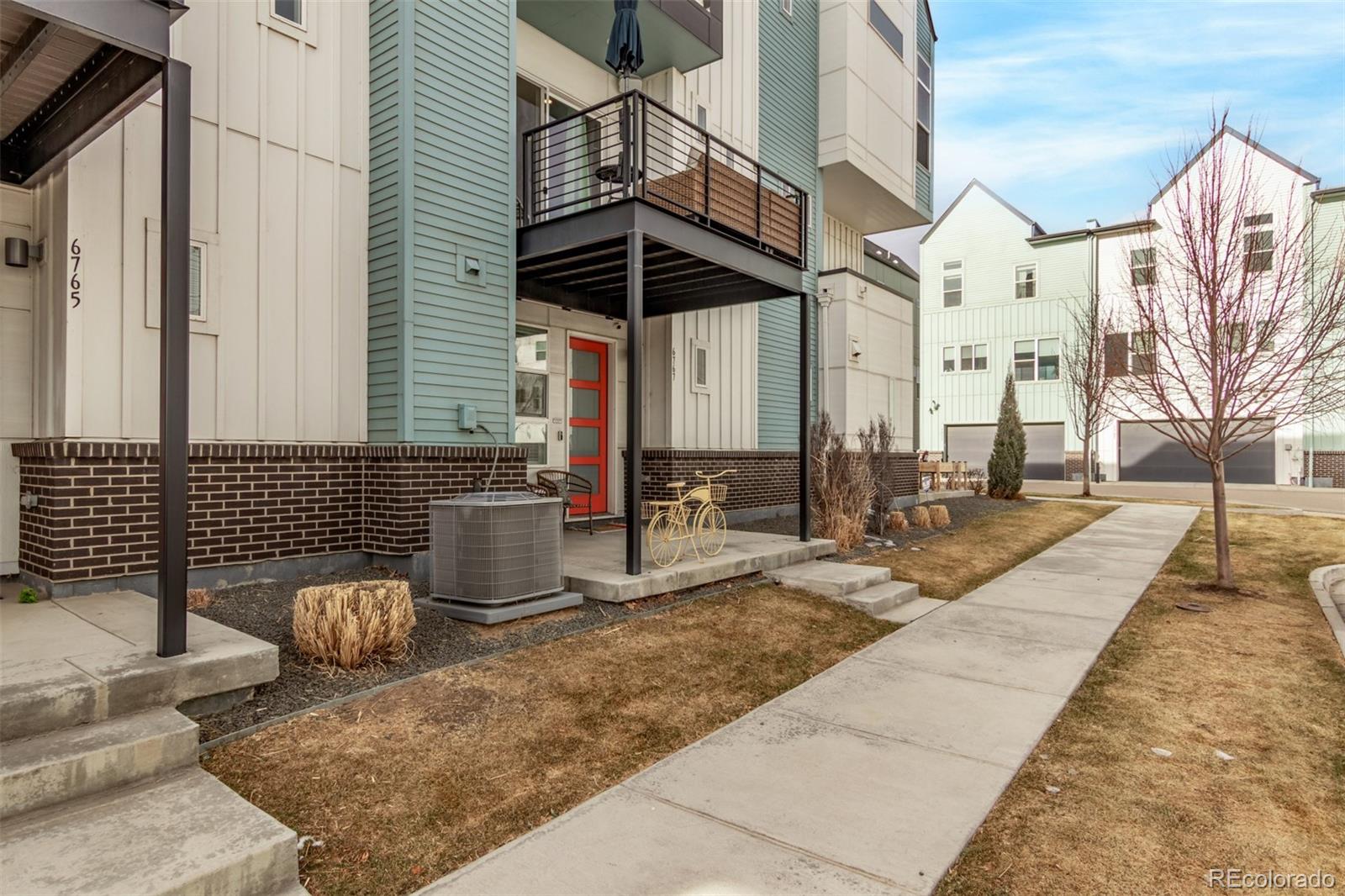 6767 Quivas Way Denver, CO 80221 - Photo 3 of 30 a view of a chairs and table in the patio