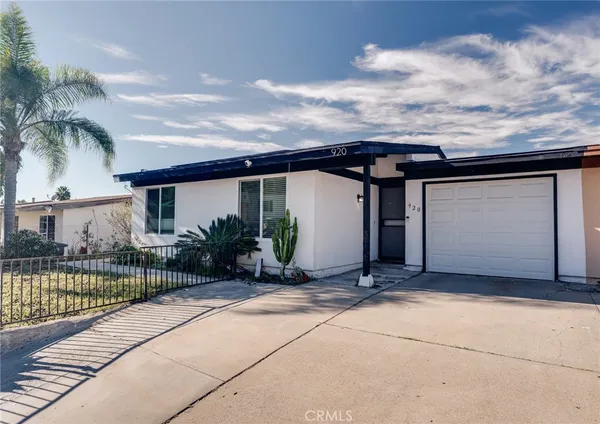 a view of a house with a patio