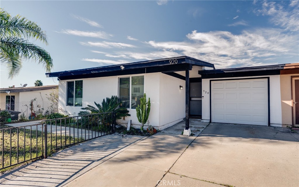 920 Raintree Place Vista, CA 92084 - Photo 2 of 18 a view of a house with a patio