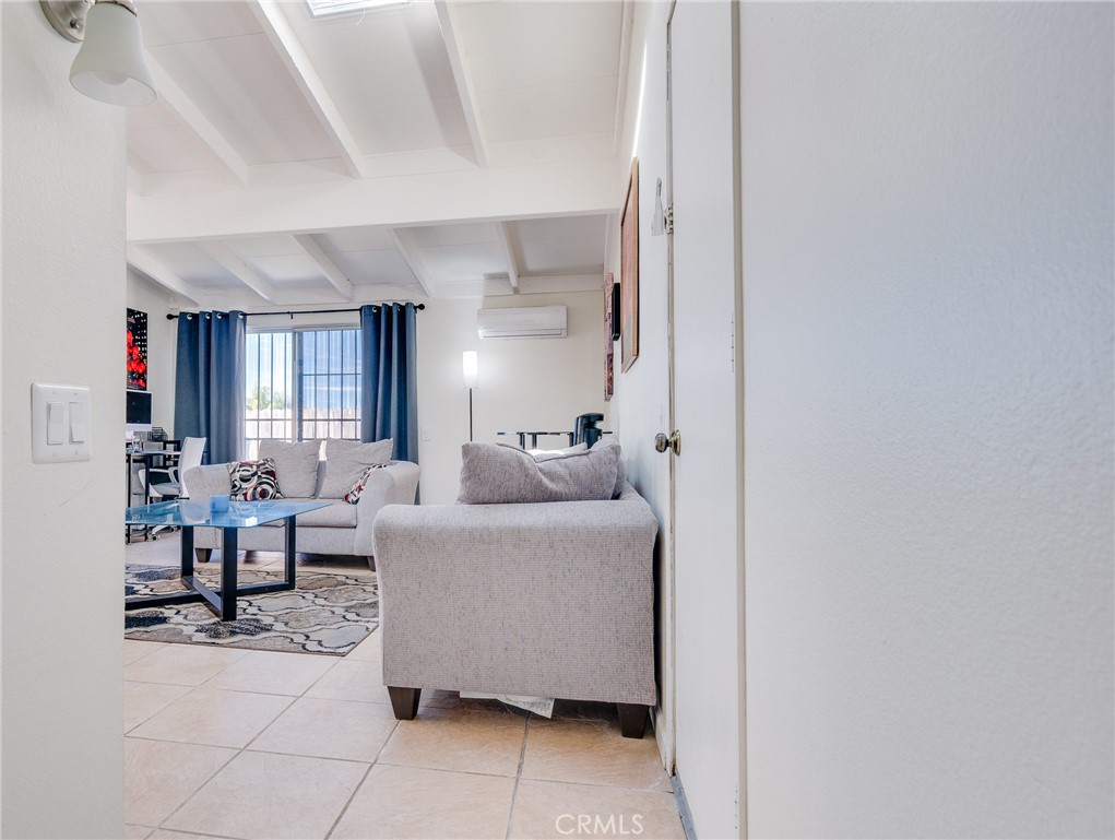 920 Raintree Place Vista, CA 92084 - Photo 3 of 18 a living room with furniture and a window