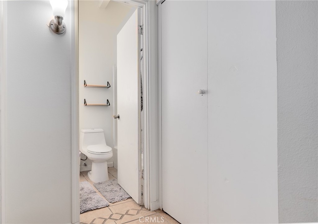 920 Raintree Place Vista, CA 92084 - Photo 4 of 18 a bathroom with a toilet and a shower