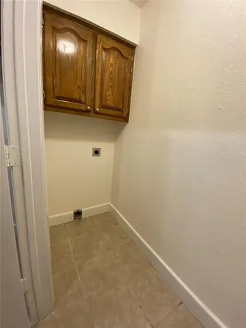 a view of room with washer and dryer