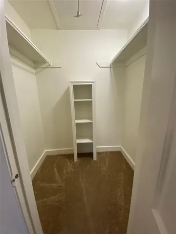 a view of a hallway to a house