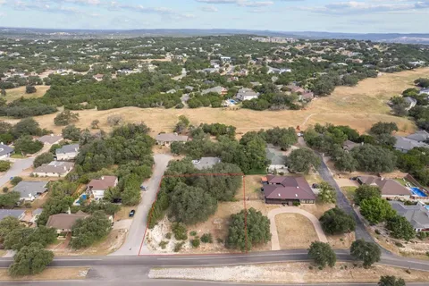 an aerial view of residential building and lake view
