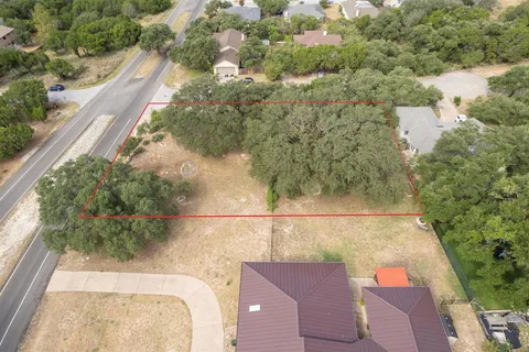 a view of balcony with yard