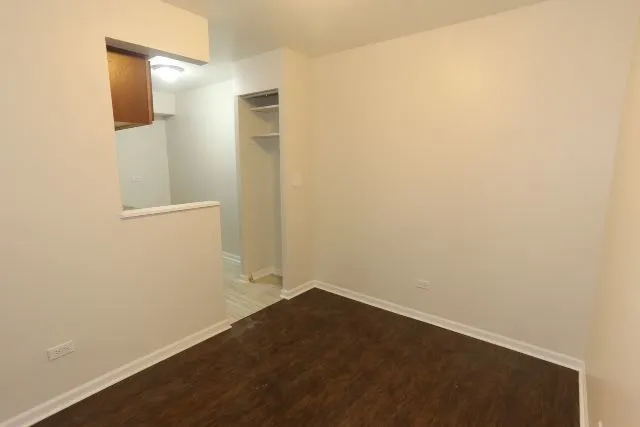 a view of small space with wooden floor