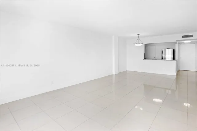 a view of a kitchen with marble kitchen