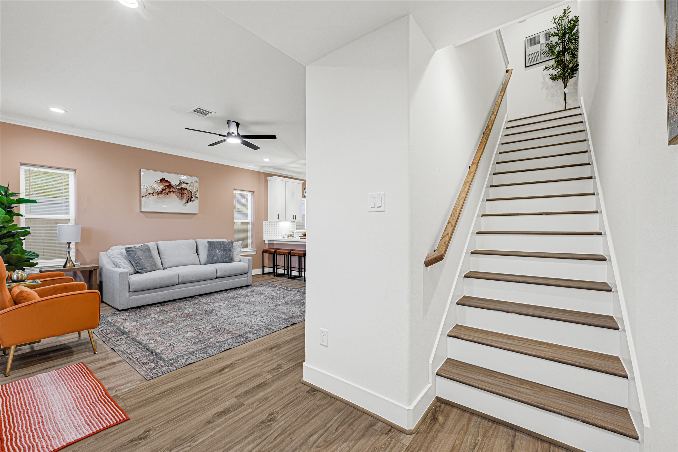 3845 Lydia Street Houston, TX 77021 - Photo 12 of 45 a living room with furniture and a wooden floor