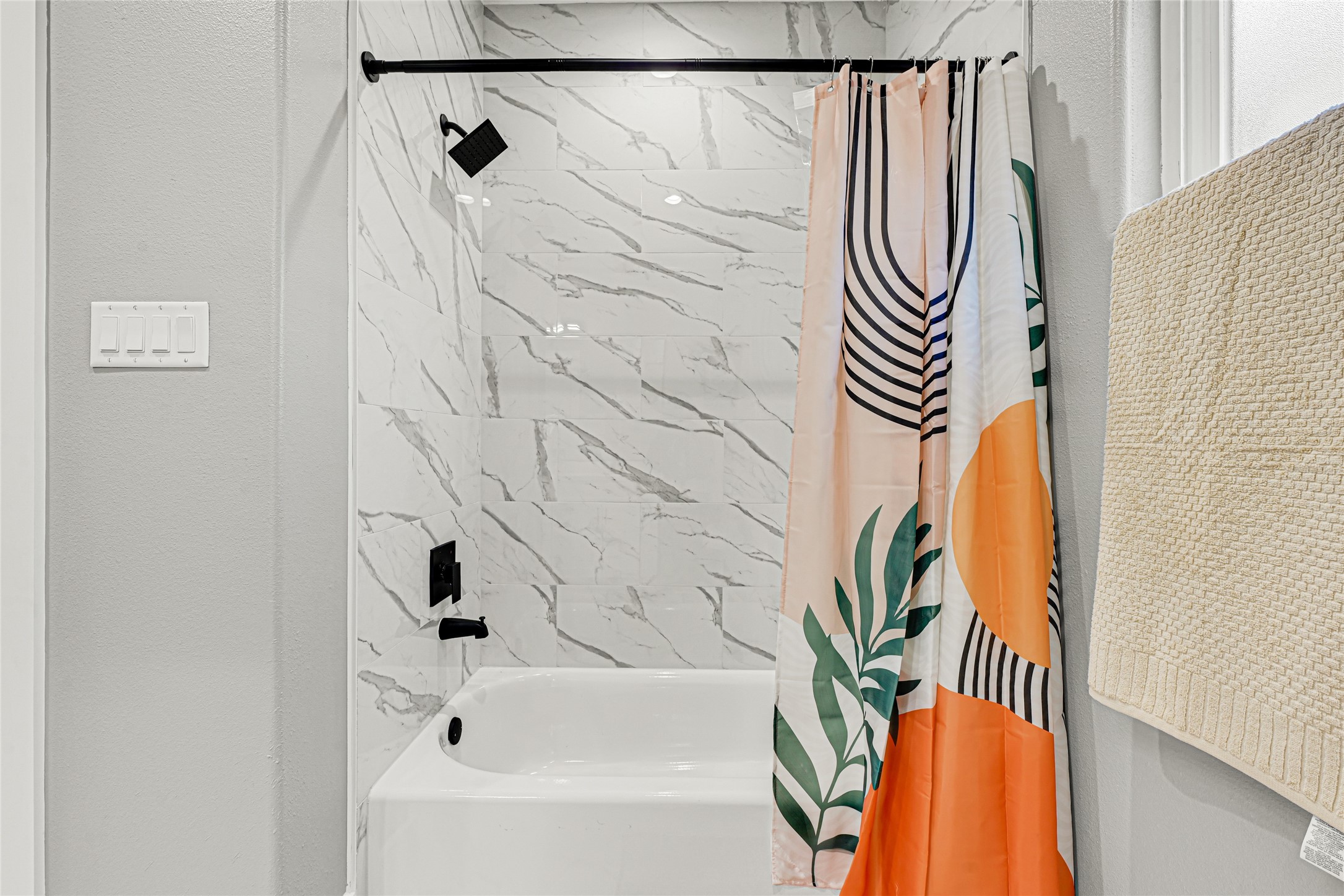 3845 Lydia Street Houston, TX 77021 - Photo 21 of 45 a bathroom with a bathtub and shower curtain
