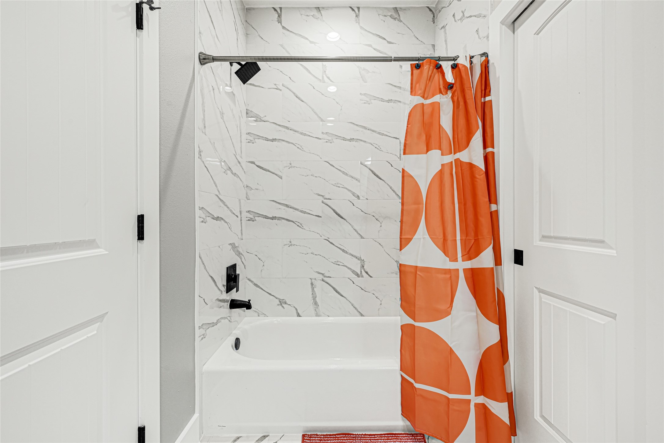 3845 Lydia Street Houston, TX 77021 - Photo 10 of 45 a bathroom with a bathtub and a shower