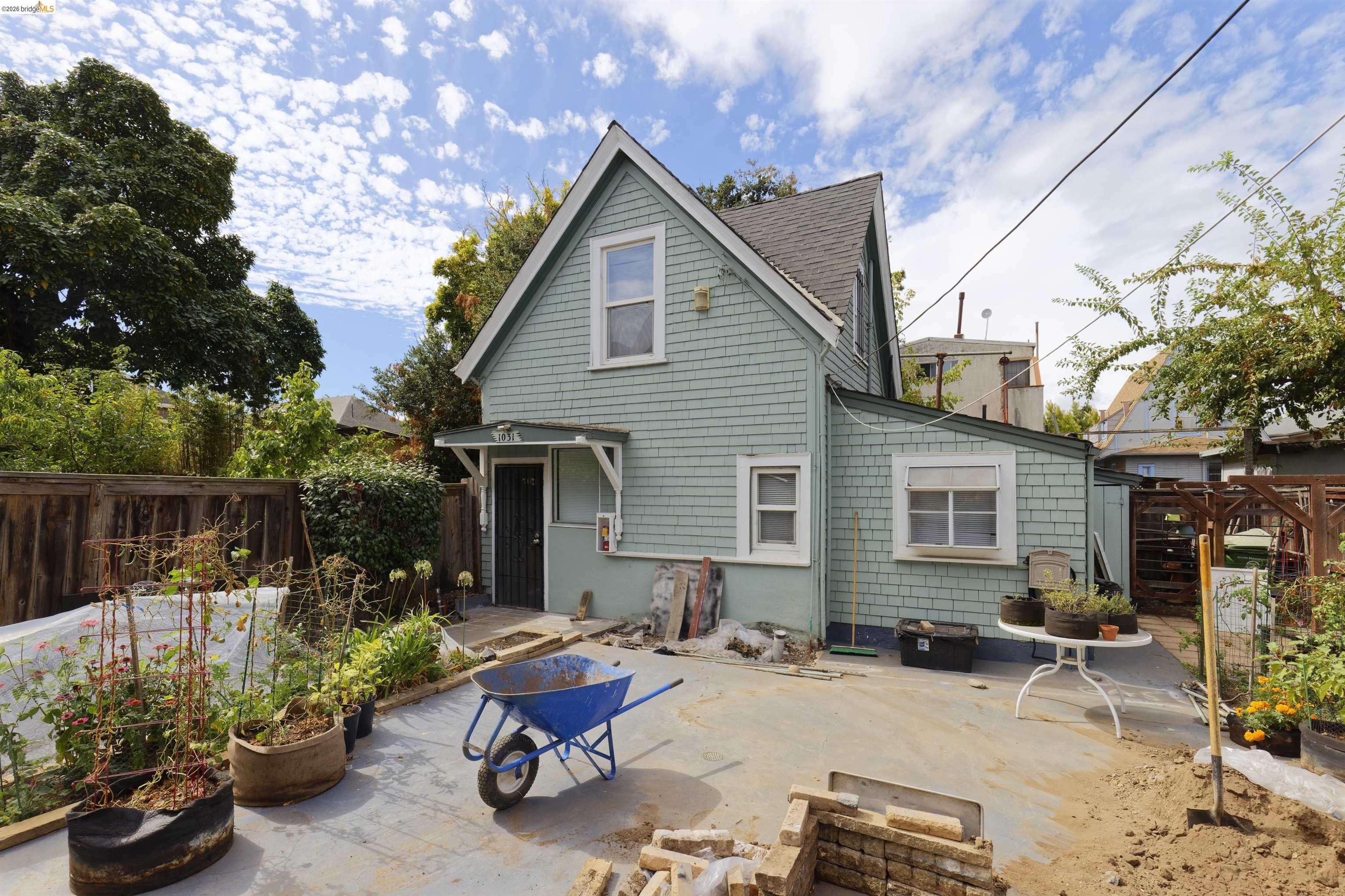 1033 Magnolia Street Oakland, CA 94607 - Photo 3 of 4 a view of backyard with outdoor seating and plants