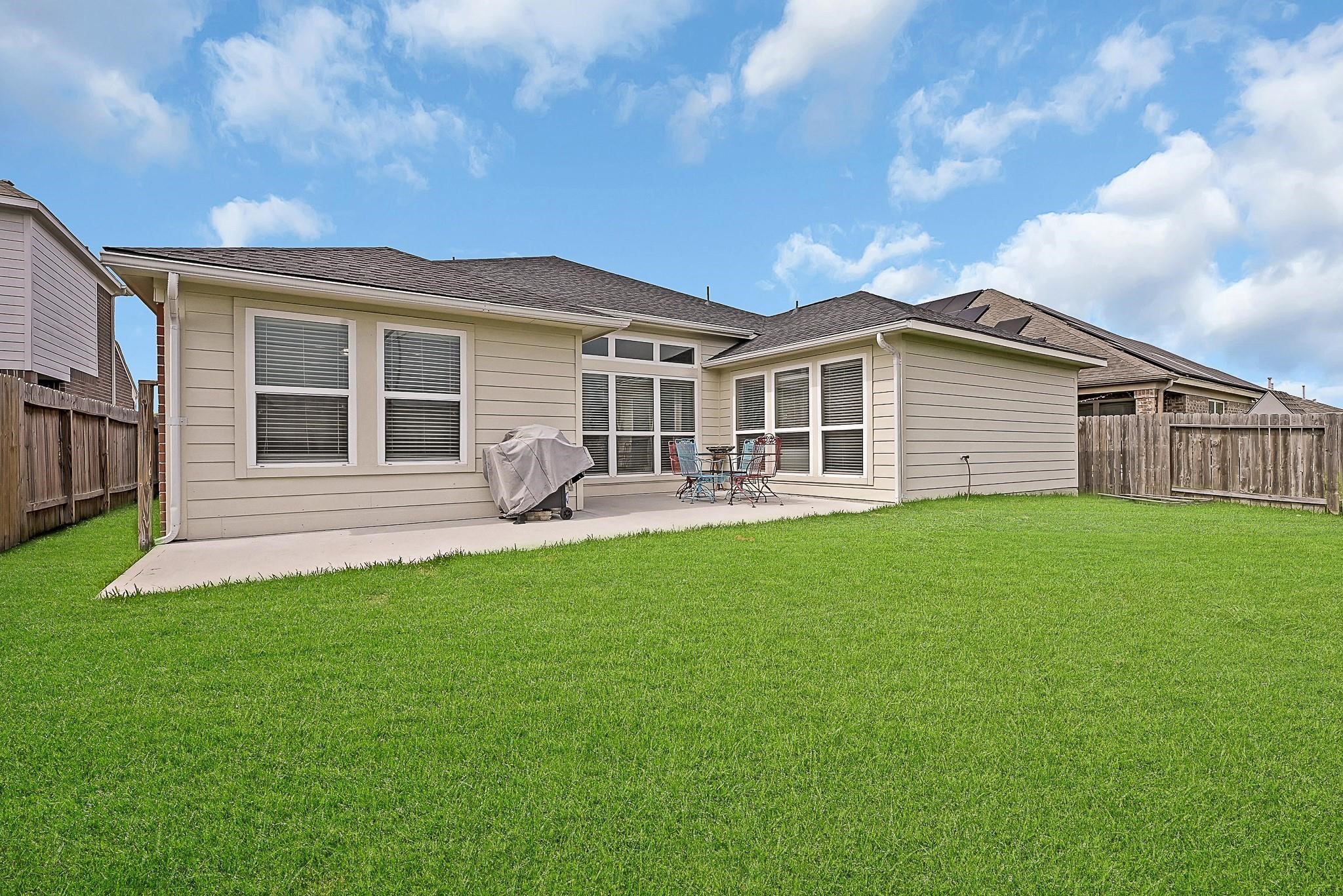 9920 Climbing Tree Street Conroe, TX 77385 - Photo 19 of 19 a front view of house with yard and green space