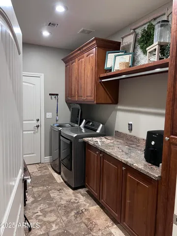 a kitchen with a stove and a refrigerator
