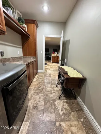 a bed room with a bed and a television