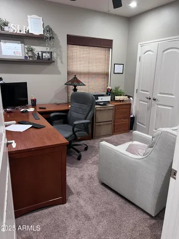 a bedroom with a bed and furniture